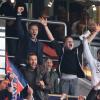 David Beckham avec ses fils Cruz, Romeo et Brooklyn lors de la 35e journée du championnat de France de football, au Parc des Princes, entre le PSG et Valenciennes (1-1) à Paris le 5 mai 2013.