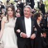 Anouchka et son père Alain Delon, Claudia Cardinale, montée des marches du Festival de Cannes, le 14 mai 2010. 