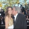 Anouchka et son père Alain Delon, Claudia Cardinale, montée des marches du Festival de Cannes, le 14 mai 2010. 