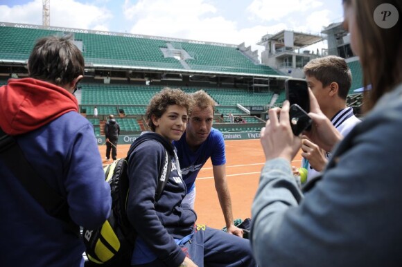 Richard Gasquet à l'entraînement sur la terre rouge de Roland Garros à Paris, le 22 mai 2013