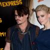 Johnny Depp et Amber Heard à la première de Rhum Express à Paris au Gaumont Marignan, Paris, le 8 novembre 2011.