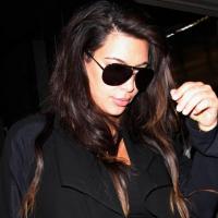 Kim Kardashian, enceinte : Comme Kanye West, elle insulte les photographes