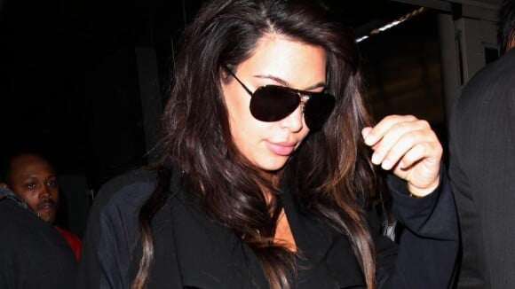 Kim Kardashian, enceinte : Comme Kanye West, elle insulte les photographes