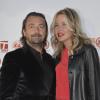 Henri Leconte et sa femme Florentine lors de la soirée des joueurs de Roland-Garros à la Résidence de l'Ambassadeur des Etats-Unis à Paris le 24 mai 2013
