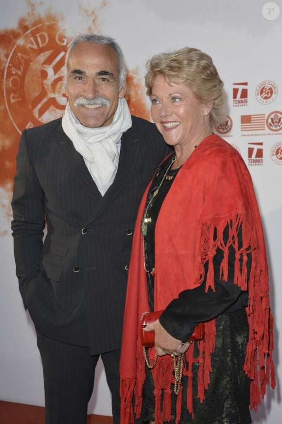 Mansour Bahrami et sa femme Véronique lors de la soirée des joueurs de Roland-Garros à la Résidence de l'Ambassadeur des Etats-Unis à Paris le 24 mai 2013
