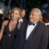 L'ancien directeur du FMI, Dominique Strauss-Kahn, et Myriam L'Aouffir sur le tapis rouge lors du 66eme festival du film de Cannes le 25 mai 2013
