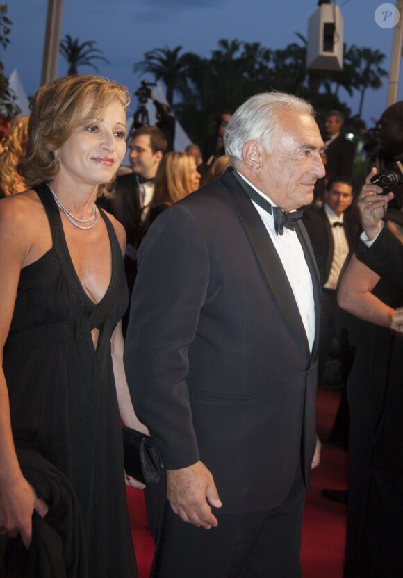 Dominique Strauss-Kahn, et Myriam L'Aouffir sur le tapis rouge lors du 66eme festival du film de Cannes le 25 mai 2013