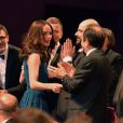 Bérénice Bejo recevant le prix d'interprétation pour Le Passé au Festival de Cannes le 26 mai 2013. A côté d'elle, son compagnon Michel Hazanavicius
