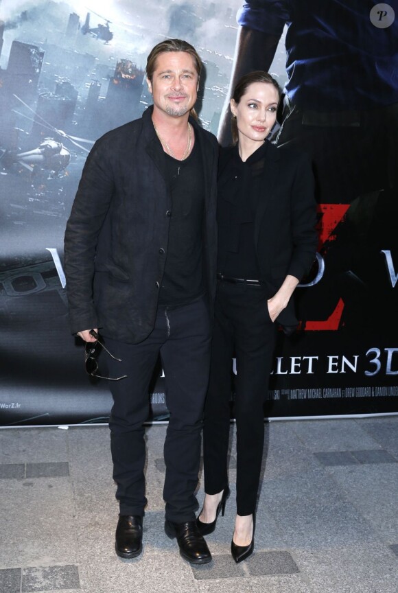 Brad Pitt et Angelina Jolie, en costume Saint Laurent, lors de l'avant-première du film "World War Z" à Paris le 3 juin 2013