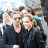 Brad Pitt et Angelina Jolie arrivant à l'avant-première du film "World War Z" à Paris sur les Champs-Elysées le 3 juin 2013