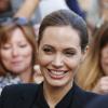 Angelina Jolie arrivant à l'avant-première du film "World War Z" à Paris sur les Champs-Elysées le 3 juin 2013