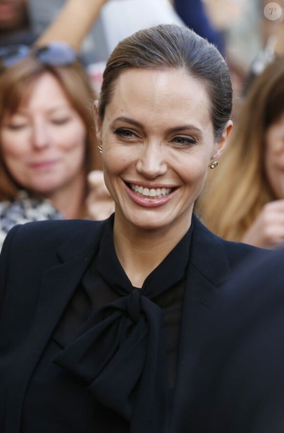 Angelina Jolie arrivant à l'avant-première du film "World War Z" à Paris sur les Champs-Elysées le 3 juin 2013