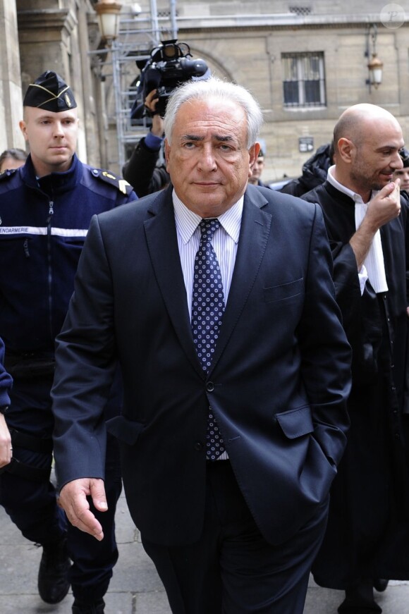 Dominique Strauss-Kahn au tribunal de Paris pour défendre ses intérêts face à l'auteure Marce Iacub et l'éditeur Stock, le 26 février 2013. 