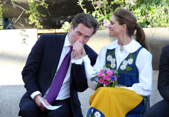 La princesse Madeleine de Suède et son fiancé Chris O'Neill lors de la Fête nationale, à Stockholm, le 6uin 2013.