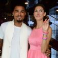 Kevin-Prince Boateng et sa compagne Melissa Satta lors d'un événement caritatif en soutient à l'Afrique à Milan, le 15 juin 2013.