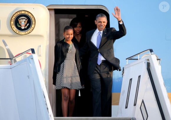 Barack Obama, sa femme Michelle Obama et ses filles Sasha et Malia à l'aéroport de Berlin. Le 18 juin 2013.