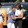 La first lady Michelle Obama et ses filles Sasha et Malia arrivent pour leur visite du Mémorial de l'Holocauste à Berlin, le 19 juin 2013.
