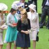 Les princesses Beatrice et Eugenie d'York ont pris part au Ladies Day du Royal Ascot le 20 juin 2013, marqué par la victoire du cheval de la reine Estimate dans la Gold Cup.