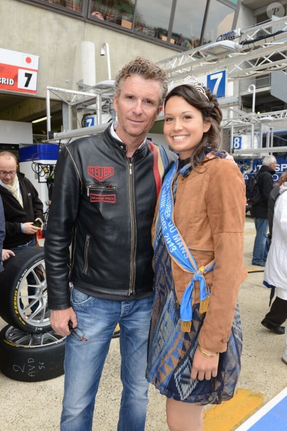 Denis Brogniart et Miss 24h Chloé lors des 24 Heures du Mans le 22 juin 2013.