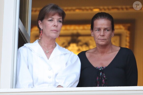 Albert de Monaco, Caroline de Hanovre et Stéphanie de Monaco assistent à la première partie des fêtes de la Saint-Jean, depuis le balcon du palais, le dimanche 23 juin 2013.