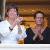 Les princesses Caroline de Hanovre et Stéphanie de Monaco assistent à la première partie des fêtes de la Saint-Jean, depuis le balcon du palais, le dimanche 23 juin 2013.