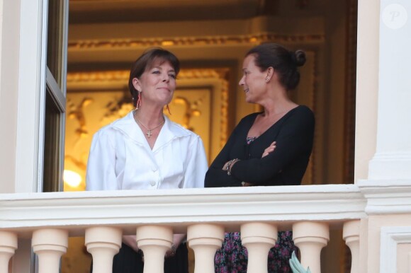 Albert de Monaco, Caroline de Hanovre et Stéphanie de Monaco assistent à la première partie des fêtes de la Saint-Jean, depuis le balcon du palais, le dimanche 23 juin 2013.