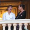 Albert de Monaco, Caroline de Hanovre et Stéphanie de Monaco assistent à la première partie des fêtes de la Saint-Jean, depuis le balcon du palais, le dimanche 23 juin 2013.