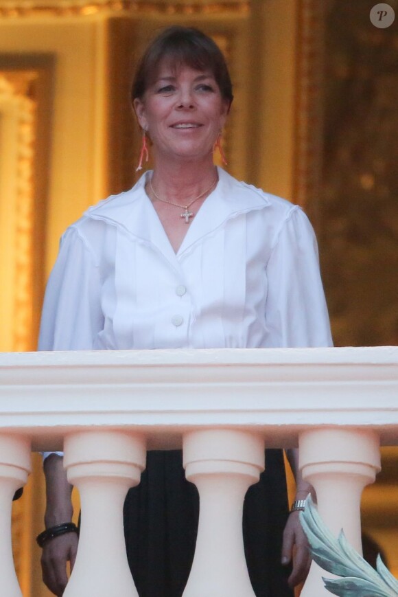Albert de Monaco, Caroline de Hanovre et Stéphanie de Monaco assistent à la première partie des fêtes de la Saint-Jean, depuis le balcon du palais, le dimanche 23 juin 2013.