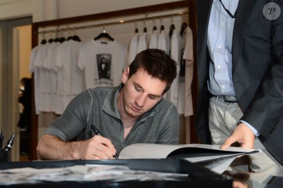 Le footballeur argentin Lionel Messi à la presentation du "livre de Lionel Messi" par Dolce & Gabbana, le 22 juin 2013 à Milan.