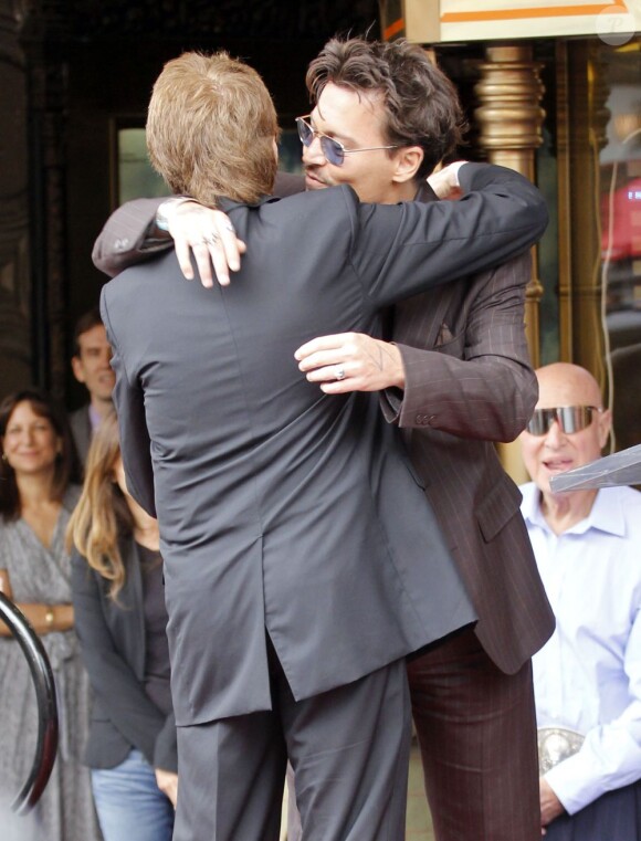 Jerry Bruckheimer, Johnny Depp lors de la remise de l'étoile de Jerry Bruckheimer sur Hollywood Boulevard à Los Angeles le 24 juin 2013