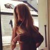 Shauna Sand gâte ses followers sur Instagram avec cette photo d'elle, topless à la fenêtre de sa chambre d'hôtel à Genève.