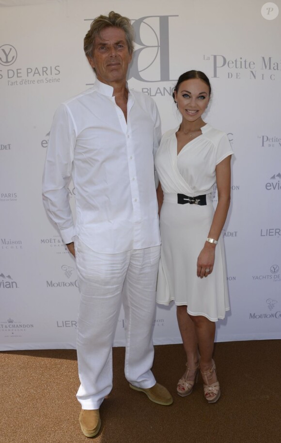 Dominique Desseigne et sa compagne Alexandra Cardinale lors de la 3ème édition du Brunch Blanc-Une croisiere sur la Seine à Paris le 30 juin 2013