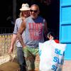 Christian Audigier et sa petite amie Nathalie Sorensen font du shopping à Ibiza, le 30 juin 2013.