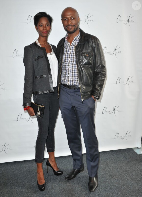 Harry Roselmack et sa femme Chrislaine au défilé Clarisse Hieraix à l'espace Cardin à Paris le 3 juillet 2013.