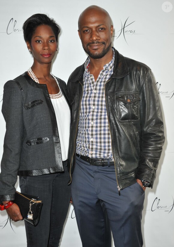Harry Roselmack et sa femme Chrislaine au défilé Clarisse Hieraix à l'espace Cardin à Paris le 3 juillet 2013.