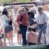 Le chanteur Bono et ses amis quittent le club 55, pour rejoindre leur yacht au large de la côte de Saint-Tropez., le 4 juillet 2013.