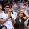 Amélie Mauresmo et Thomas Drouet lors de la demi-finale de Wimbledon qui opposait Marion Bartoli à Kirsten Flipkens le 4 juillet 2013 à Londres