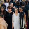 Hapsatou Sy, Roselyne Bachelot, Audrey Pulvar et Elisabeth Bost à la montée des marches du film The Immigrant, lors du 66e festival du film de Cannes. Le 24 mai 2013.