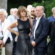 Exclusif - Valérie Grall (soeur du défunt), sa compagne Valérie Champetier de Ribes et son ex-femme Frédérique Noiret lors des obsèques du réalisateur Sébastien Grall au cimetière parisien de Bagneux le 17 juillet 2013