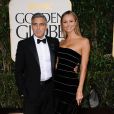 George Clooney et Stacy Keibler arrivant aux Golden Globes à Los Angeles le 13 janvier 2013