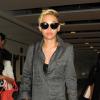 Miley Cyrus arrive à l'aéroport d'Heathrow de Londres. Le 17 juillet 2013.
