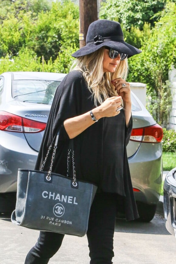 Fergie et Josh Duhamel se rendent dans leur nouvelle maison de Los Angeles, le 22 juillet 2013.