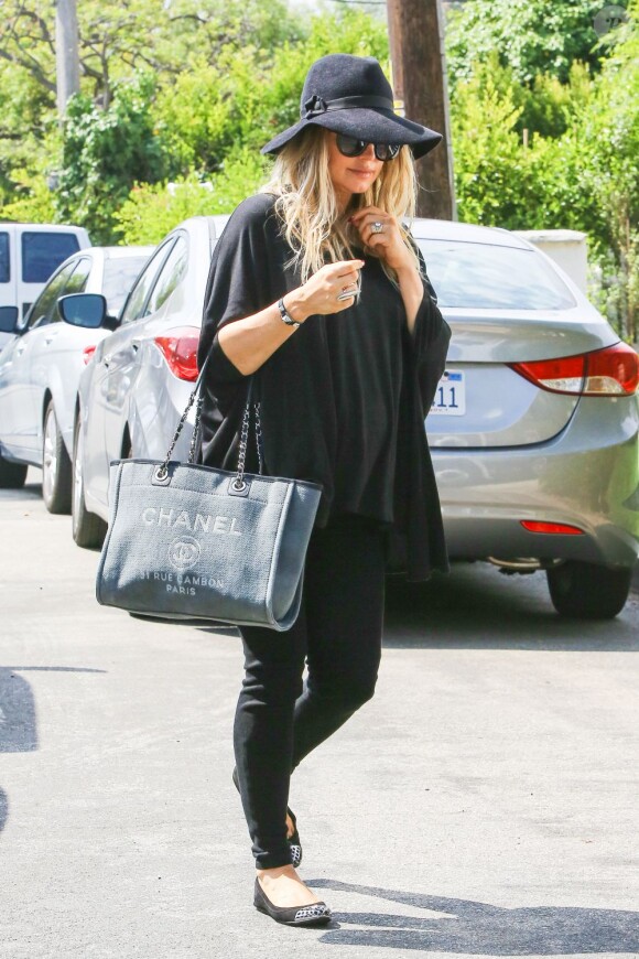 Fergie et Josh Duhamel se rendent dans leur nouvelle maison de Los Angeles, le 22 juillet 2013.