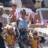 Nicole Richie, Joel Madden et leurs enfants Harlow et Sparrow quittent le restaurant "Nioulargo" à Saint-Tropez le 23 juillet 2013