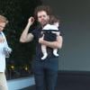 Perez Hilton et son fils à la baby shower de la chanteuse Fergie à Beverly Hills, le 28 juillet 2013.