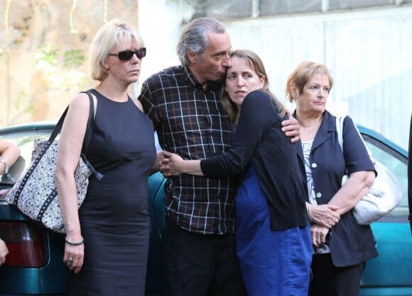 Elisabeth Lafont et David Lafont avec sa femme, fille et fils de Bernadette Lafont, lors des funérailles de l'actrice au temple de Saint-André-de-Valborgne dans le Gard le 29 juillet 2013
