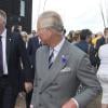 Le prince Charles, accompagné de son épouse Camilla Parker Bowles, au Festival de l'huître de Whitstable, dans le Kent, le 29 juillet 2013. Une sortie à l'occasion de laquelle il a confié que son petit-fils le prince George serait en un rien de temps surnommé Georgie.