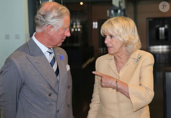 Le prince Charles en visite officielle avec son épouse la duchesse de Cornouailles à Chatham, dans le Kent, le 29 juillet 2013, pour l'inauguration d'un patronage du Prince's Trust.