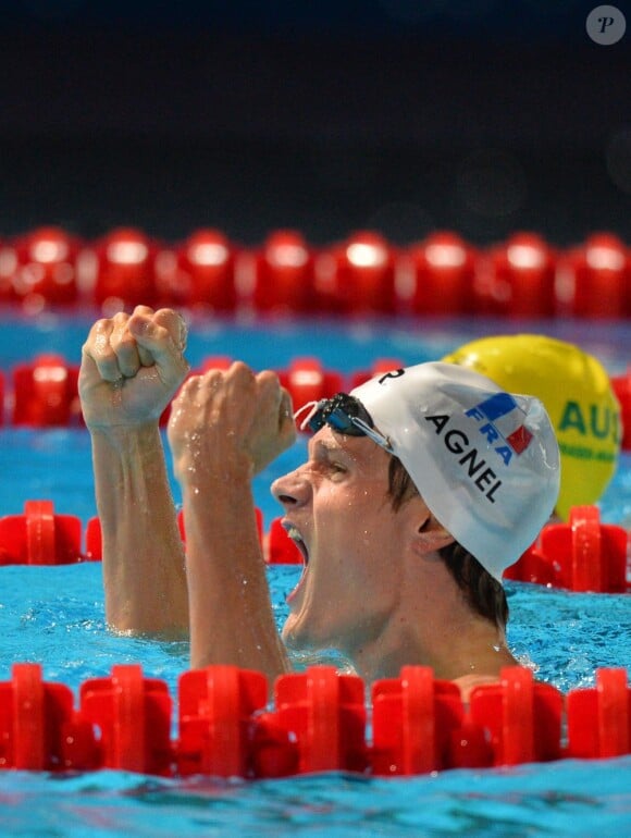 Yannick Agnel hurle sa joie après sa victoire en finale du 200 m nage libre lors des championnats du monde de natation à Barcelone au Palau Sant Jordi, le 30 juin 2013