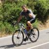 Nicolas Sarkozy sur le vélo pendant ses vacances en famille au Cap Nègre près de Cavalaire, le 3 août 2013.